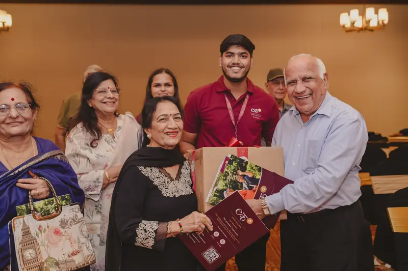 Gift presentation to a senior participant