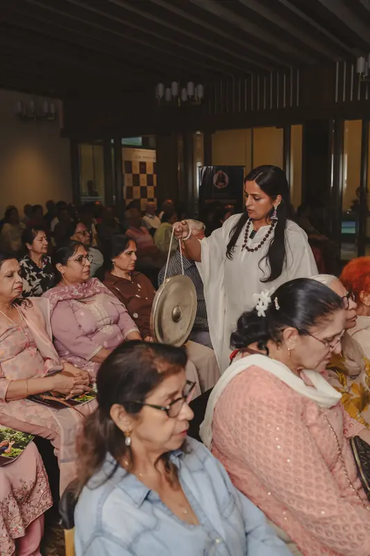 Senior attendees participating in an event interaction