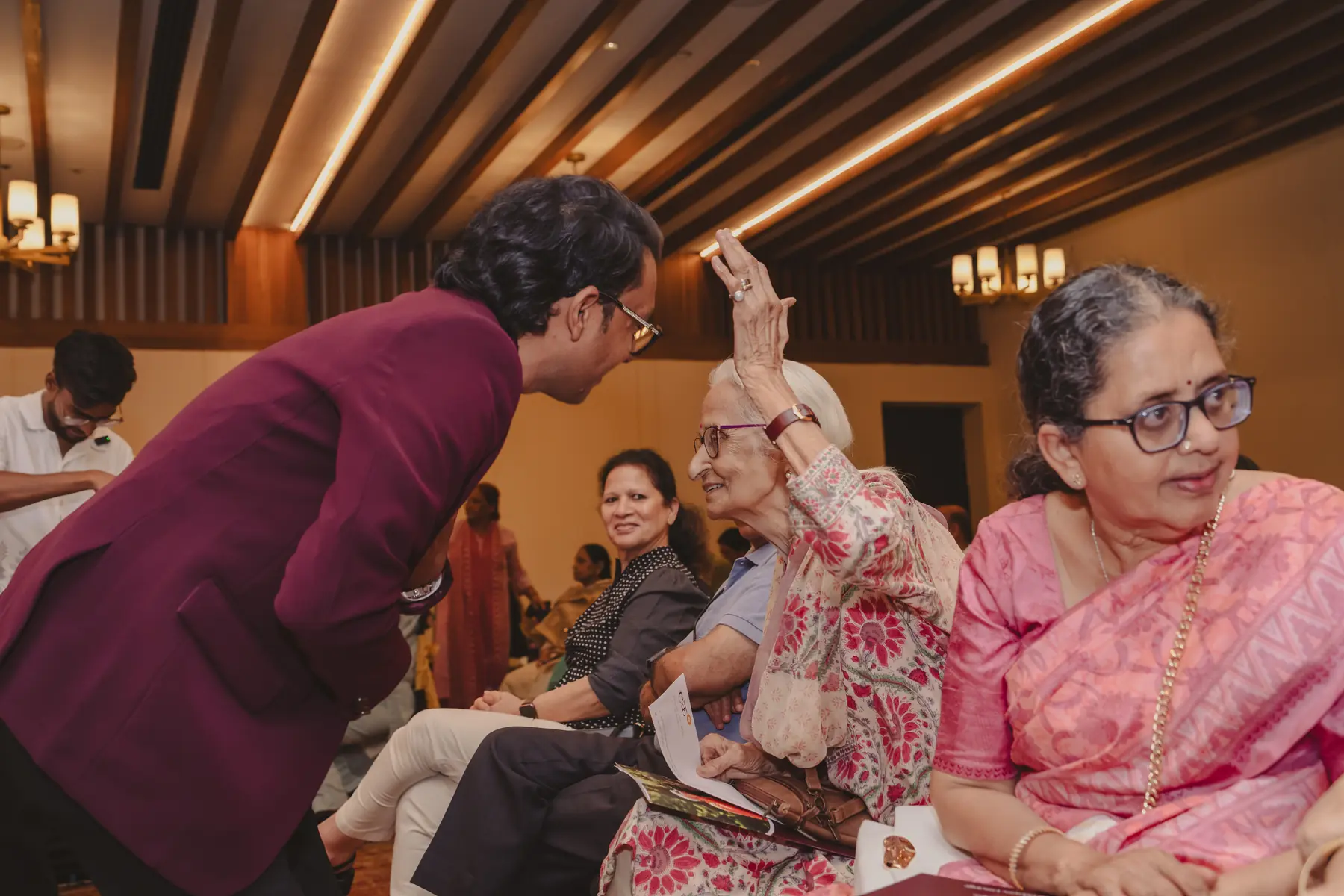 Ekaan Wellness Care Manager with a senior attendee